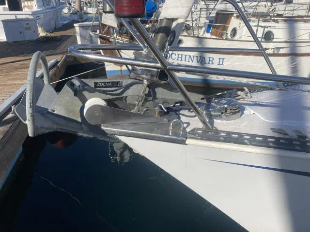 Slide: The Image of Bow of a 1980 Sceptre 36 sailboat with Rocna anchor at dock. - 31