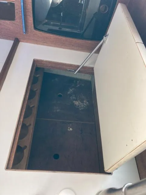 Slide: The Image of Open storage compartment in a 1980 Sceptre 36 boat interior. - 8
