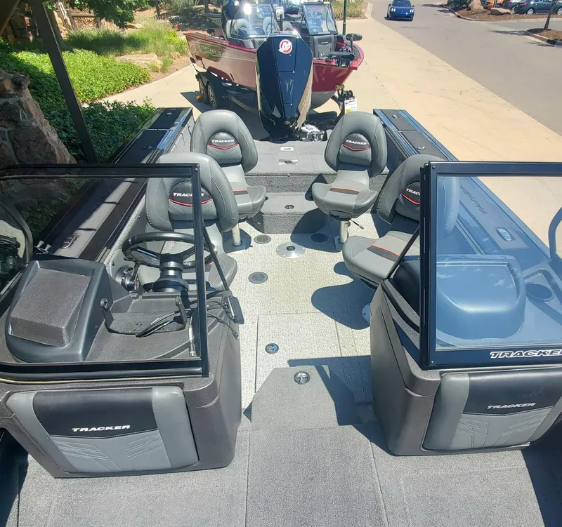 Slide: The Image of 2024 Tracker Targa V-19 WT boat interior with seating and console. - 3