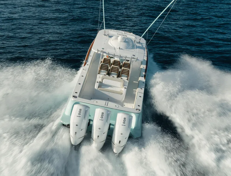 Slide: The Image of 2025 Mag Bay 43 CC boat speeding on the ocean. - 10