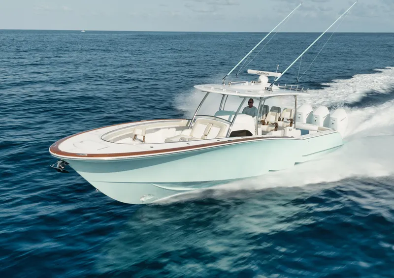 Slide: The Image of 2025 Mag Bay 43 CC cruising on open water. - 2