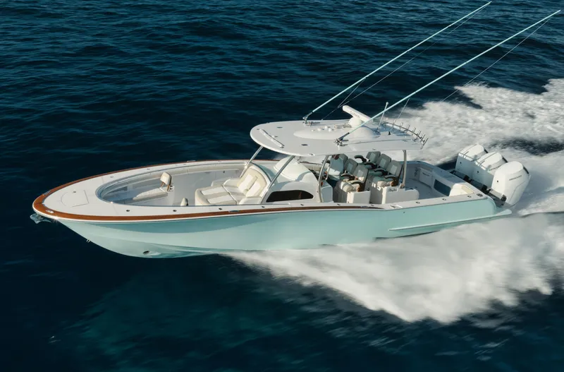 Slide: The Image of 2025 Mag Bay 43 CC cruising on open water. - 25