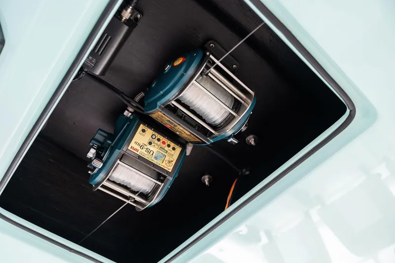 Slide: The Image of Electric fishing reels on the 2025 Mag Bay 43 CC boat. - 27