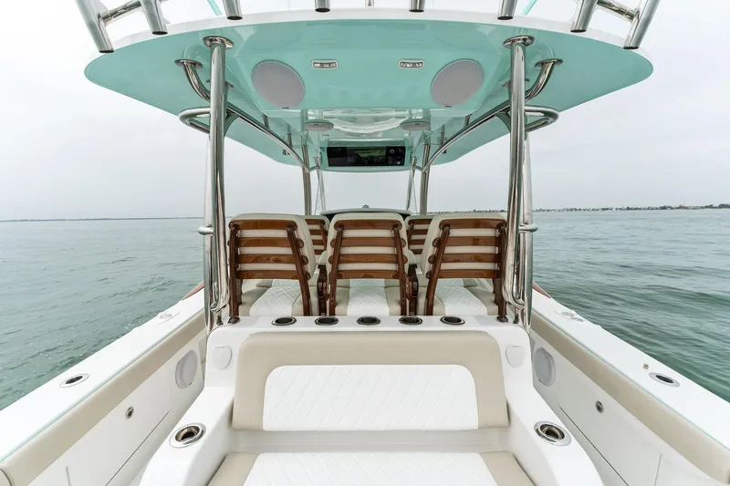 Slide: The Image of 2025 Mag Bay 43 CC center console boat with seating and ocean view. - 36