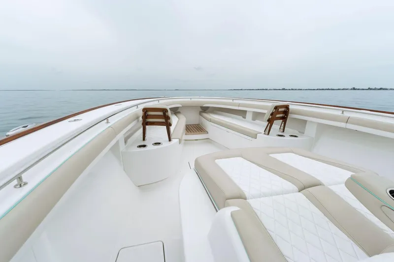 Slide: The Image of 2025 Mag Bay 43 CC boat with spacious seating and ocean view. - 39