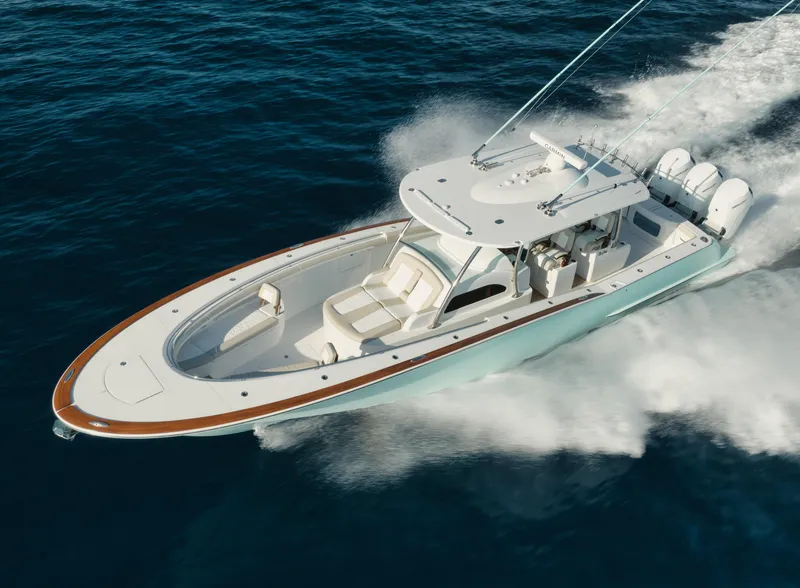 Slide: The Image of 2025 Mag Bay 43 CC boat cruising on open water. - 6