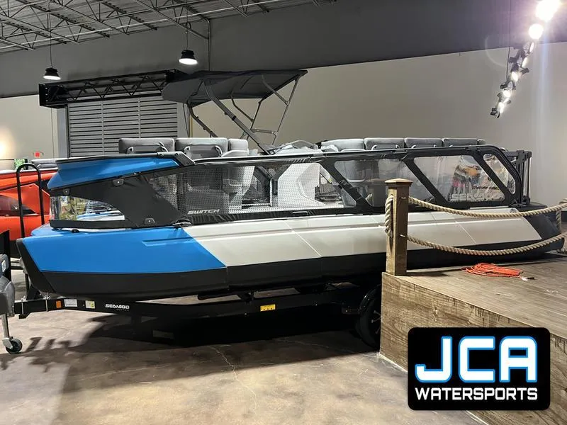 The Image of 2023 Sea-Doo Switch 19-170hp pontoon boat displayed at JCA Watersports showroom. - 1