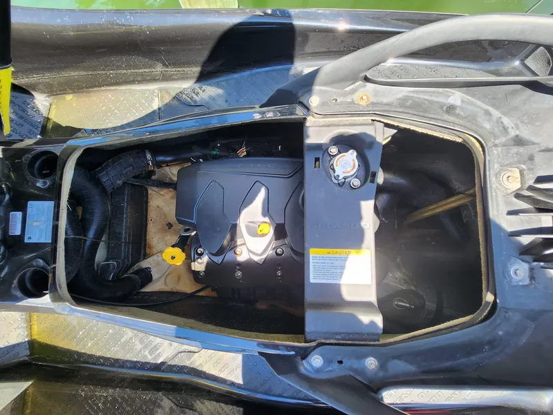Slide: The Image of 2017 Sea-Doo Limited GTX engine compartment with visible components and wiring. - 6