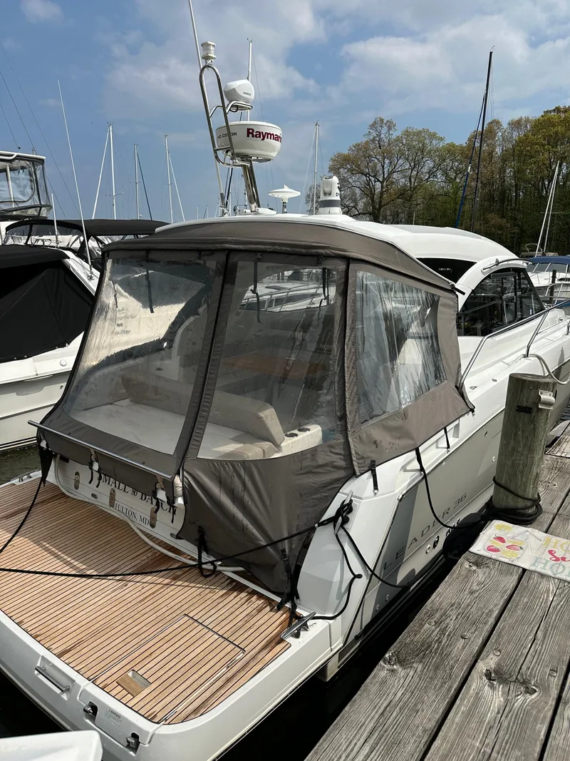 Slide: The Image of 2016 Jeanneau Leader 36 yacht docked at a marina. - 10