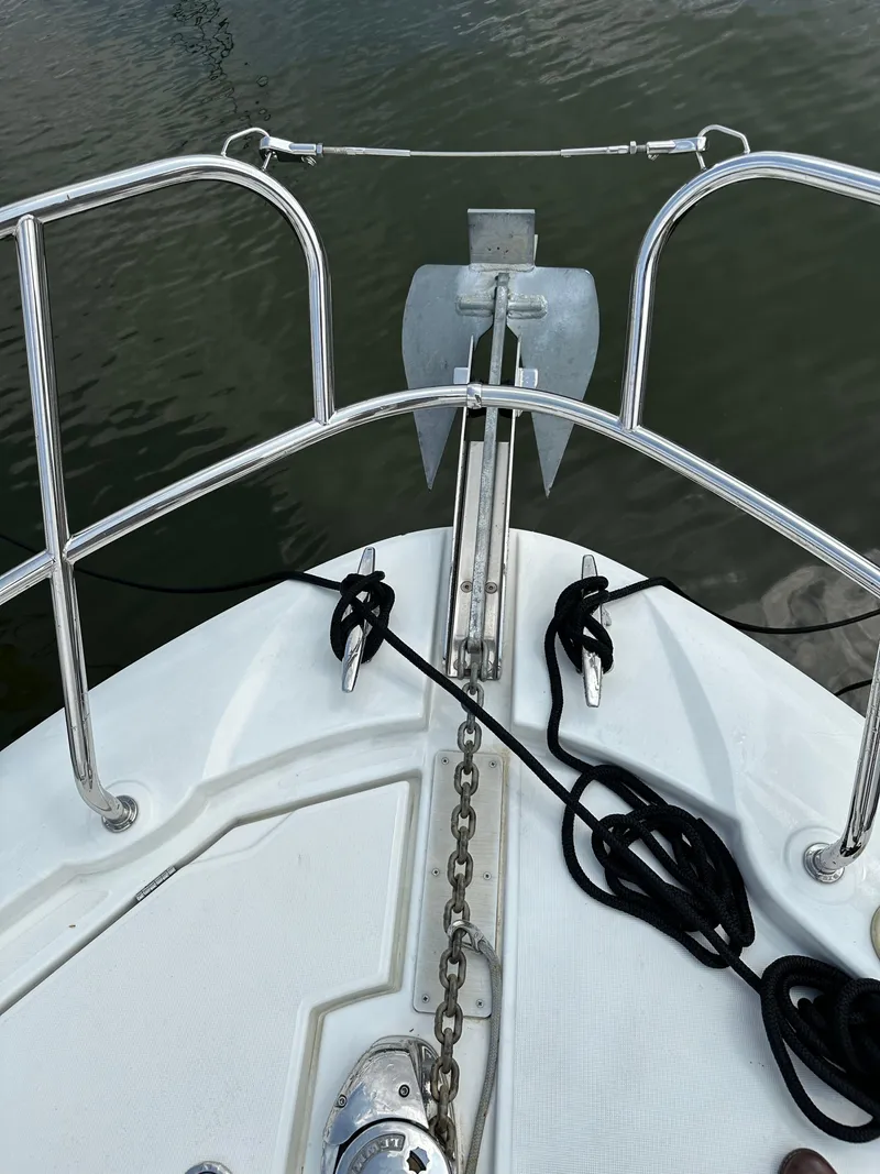 Slide: The Image of Bow of 2016 Jeanneau Leader 36 with anchor and mooring lines. - 15