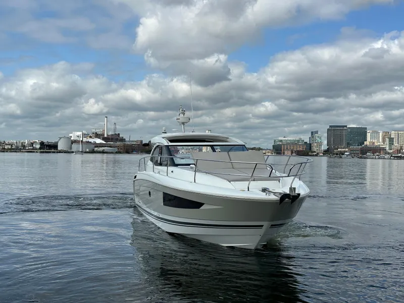 Slide: The Image of 2016 Jeanneau Leader 36 yacht cruising on a cloudy day. - 2