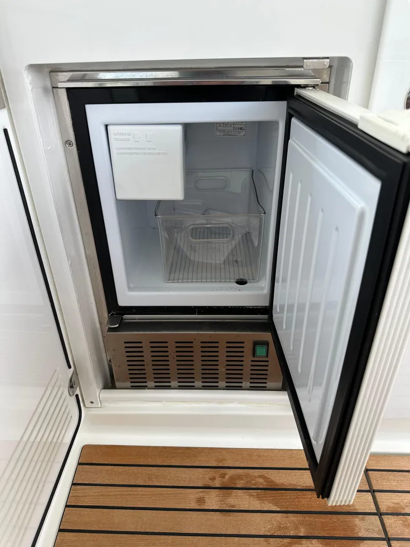 Slide: The Image of Open mini fridge on Jeanneau Leader 36 yacht, 2016 model. - 25