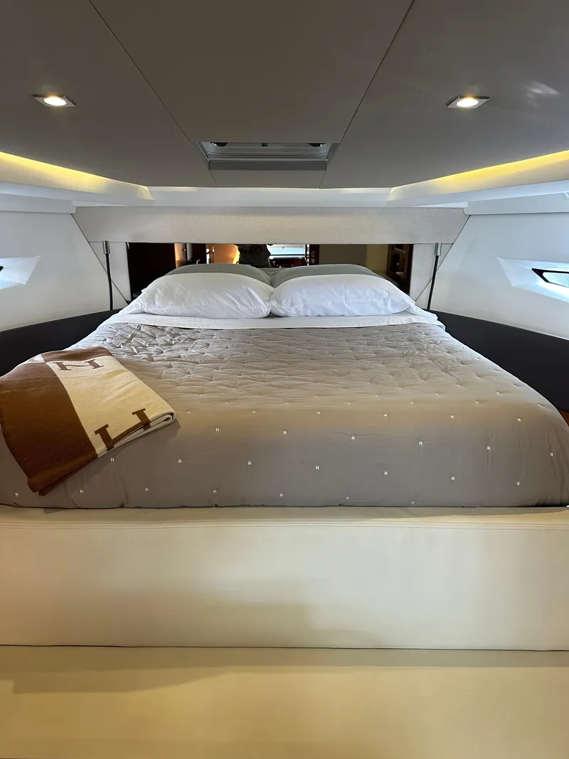 Slide: The Image of Luxurious bedroom interior of 2016 Jeanneau Leader 36 yacht with cozy bedding. - 36