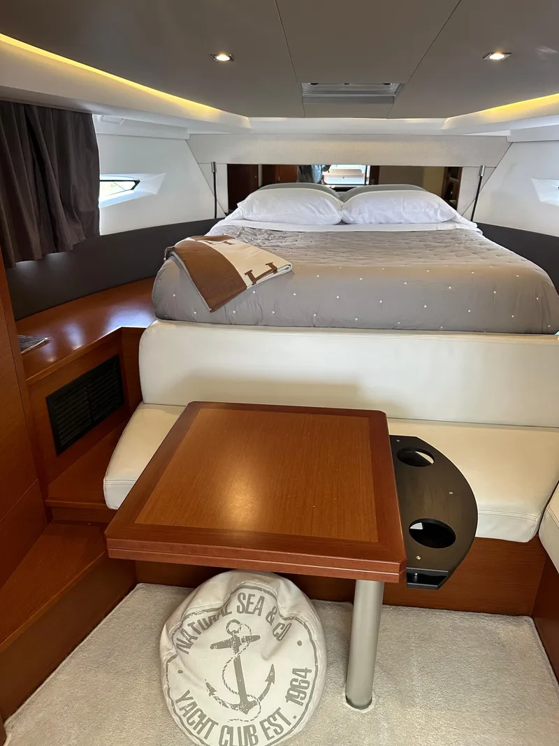 Slide: The Image of Luxurious interior of 2016 Jeanneau Leader 36 yacht with cozy bed and seating area. - 37