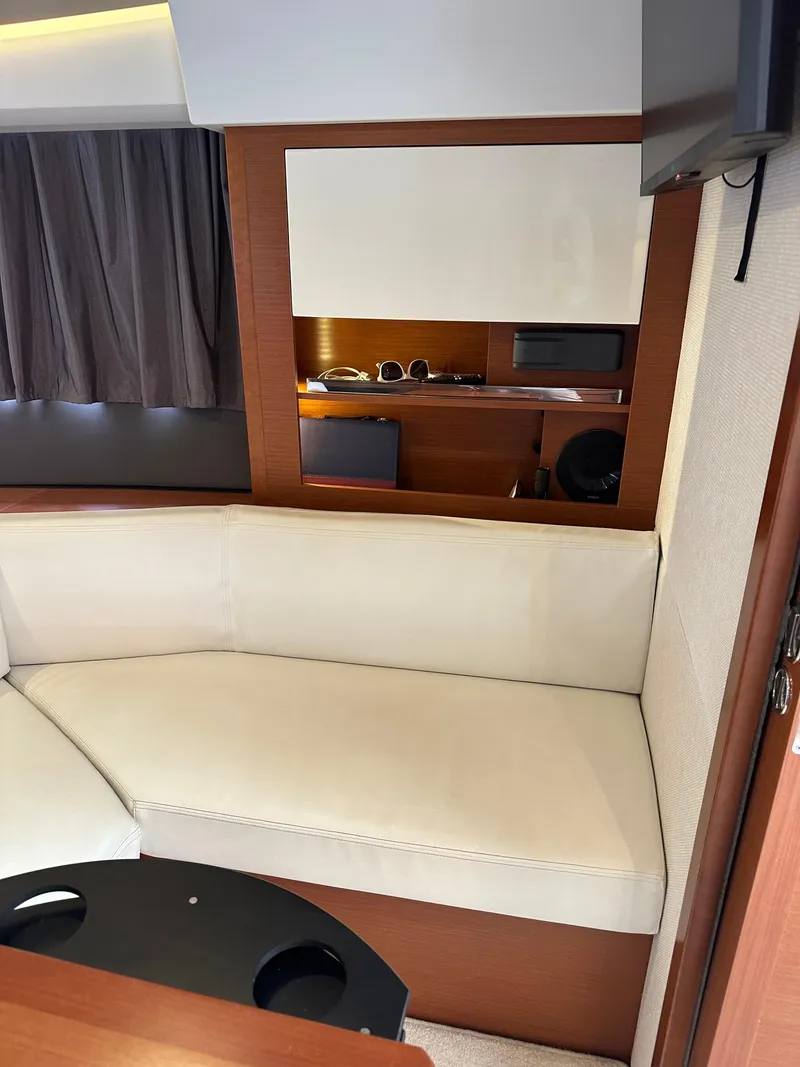 Slide: The Image of Interior seating area of a 2016 Jeanneau Leader 36 yacht. - 40