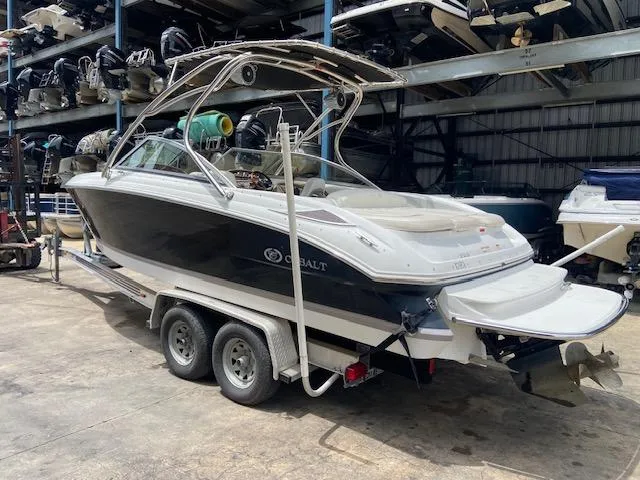 Slide: The Image of 2008 Cobalt 222 boat on a trailer in a storage facility. - 4