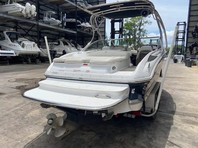 Slide: The Image of 2008 Cobalt 222 boat in storage facility, rear view. - 5