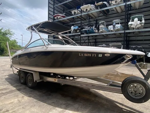 Slide: The Image of 2008 Cobalt 222 boat on a trailer in a storage facility. - 7