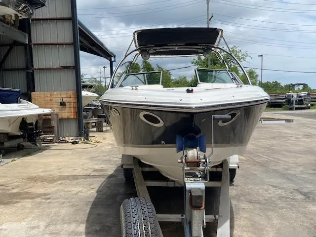 Slide: The Image of 2008 Cobalt 222 boat on a trailer in a boatyard. - 9