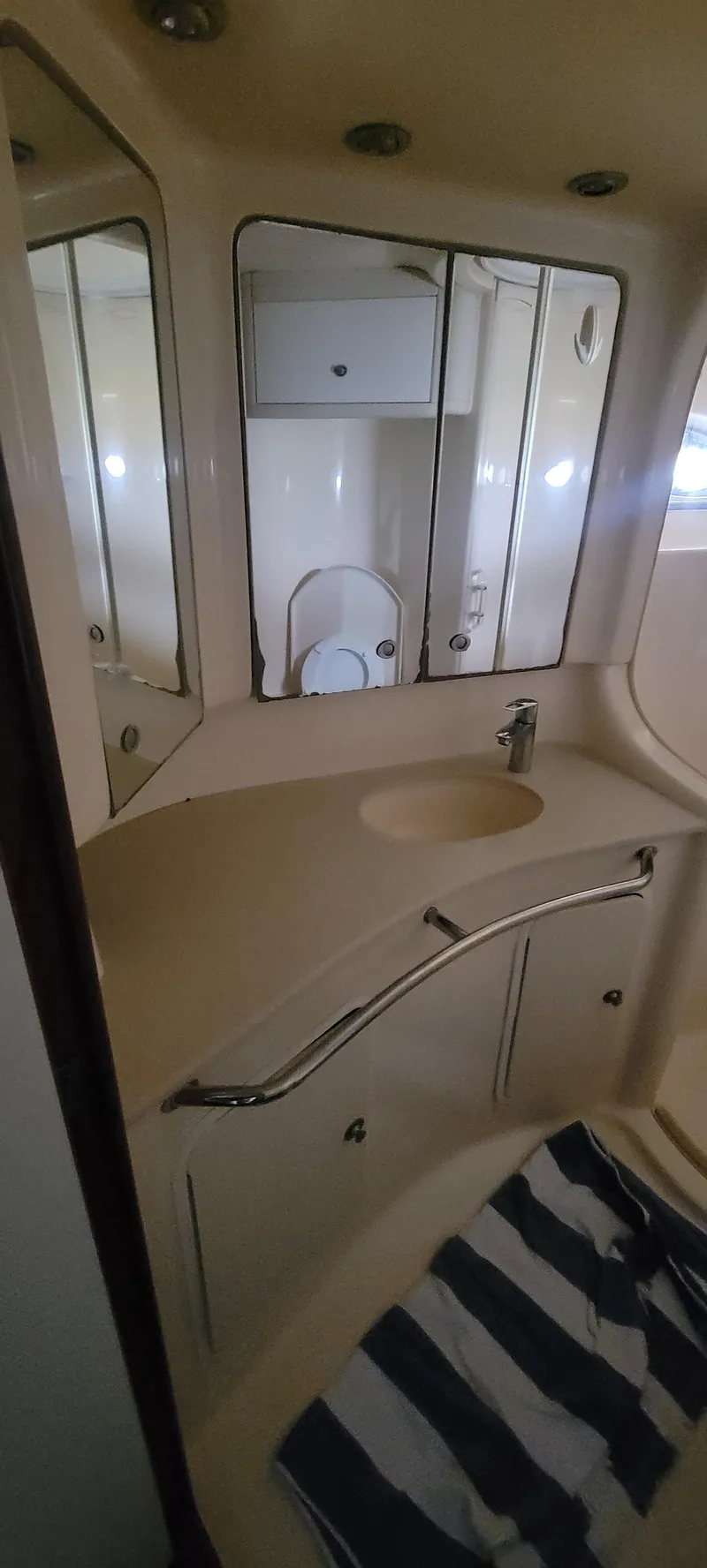 Slide: The Image of Bathroom vanity area in 2004 Sea Ray 480 Sedan Bridge yacht. - 36
