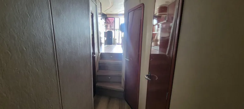 Slide: The Image of Interior hallway of a 2004 Sea Ray 480 Sedan Bridge yacht. - 40