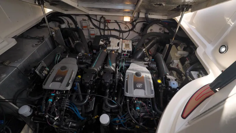 Slide: The Image of Engine compartment of a 2006 Sea Ray 320 Sundancer boat. - 34
