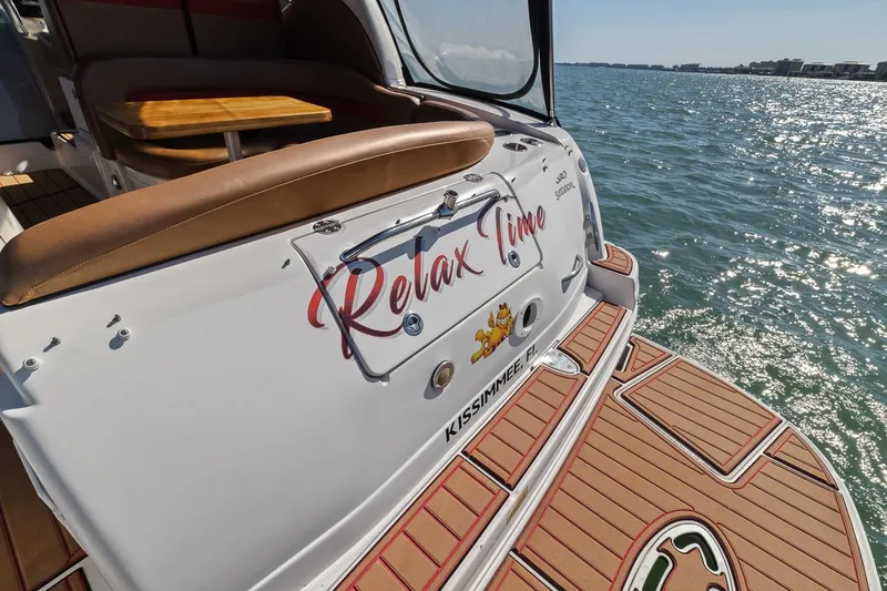 Slide: The Image of 2006 Sea Ray 320 Sundancer boat named Relax Time on the water. - 8