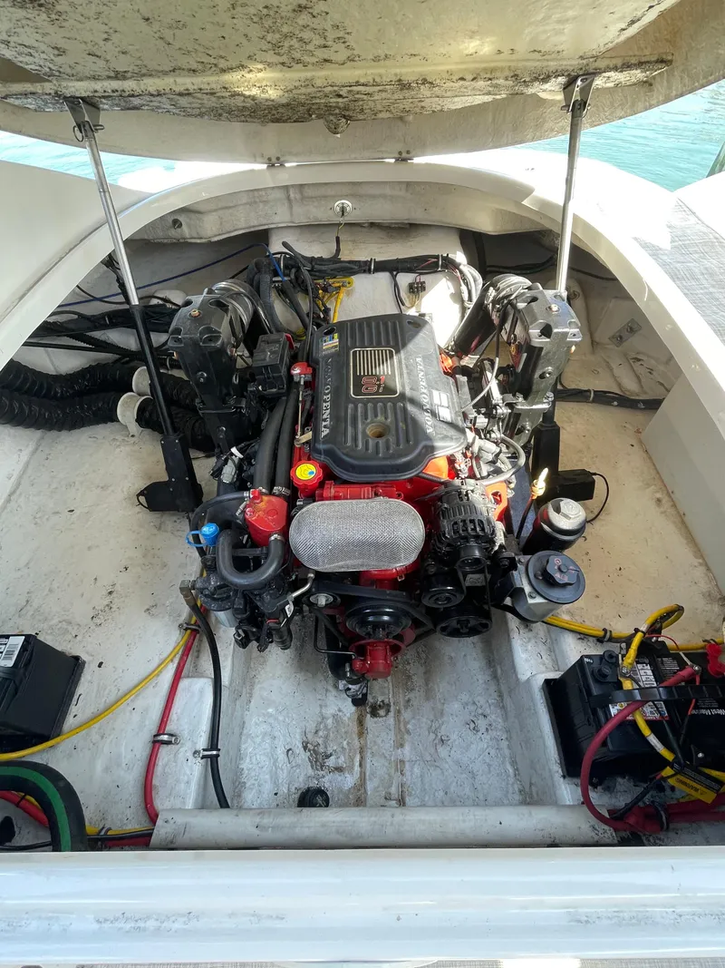 Slide: The Image of 2009 Chaparral 276 SSX engine compartment with open hatch. - 13