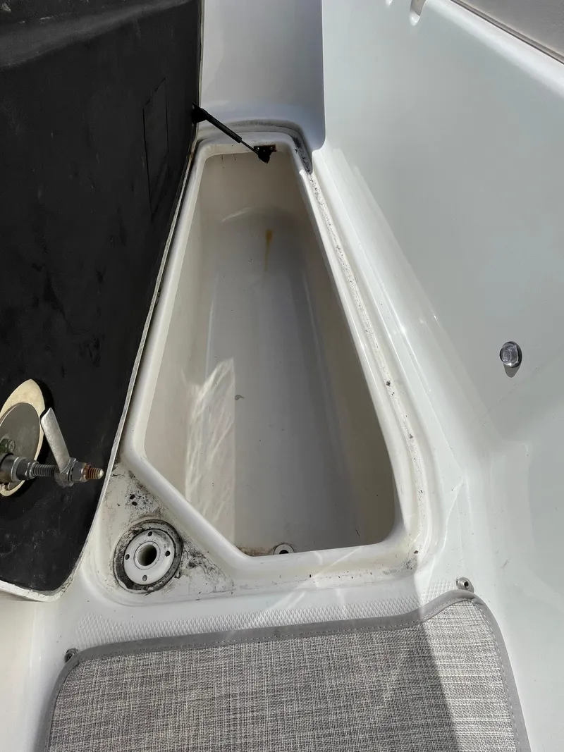 Slide: The Image of Storage compartment of a 2009 Chaparral 276 SSX boat. - 15
