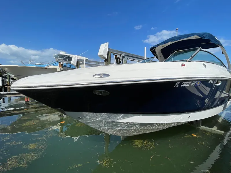 Slide: The Image of 2009 Chaparral 276 SSX boat docked in marina. - 31