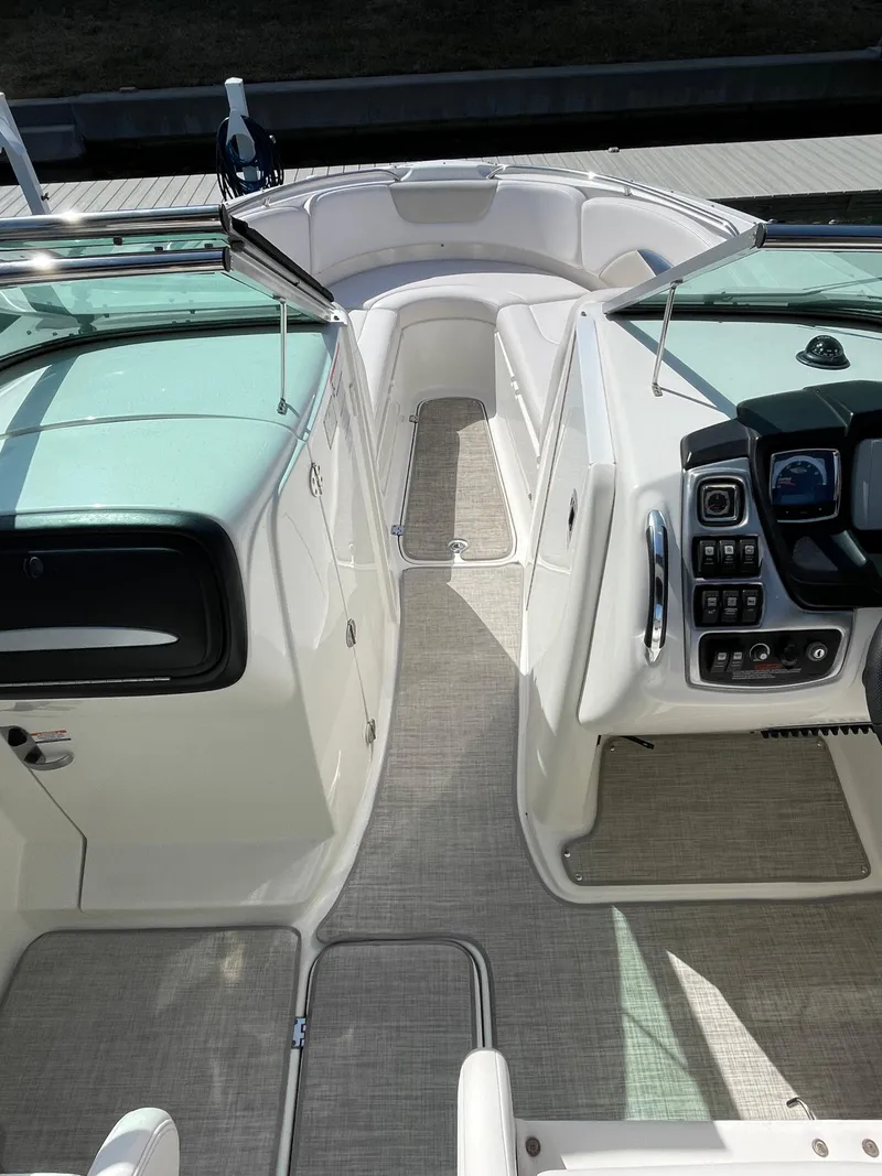 Slide: The Image of 2009 Chaparral 276 SSX boat interior with helm and seating area. - 37