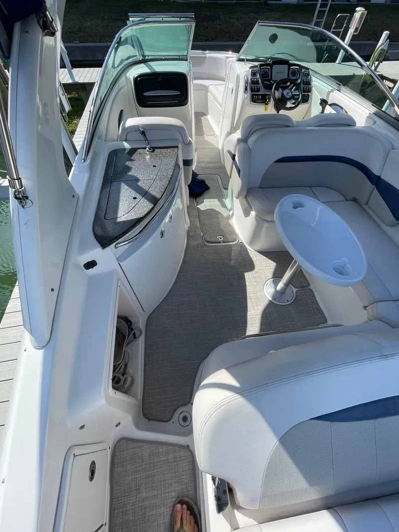 Slide: The Image of 2009 Chaparral 276 SSX boat interior with seating and helm. - 5