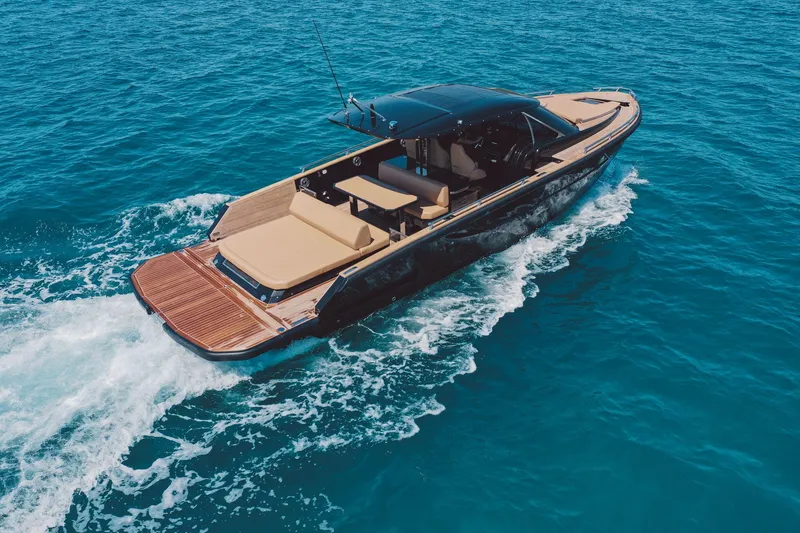 The Image of 2025 Focus Forza 37 luxury yacht cruising on clear blue ocean waters. - 1