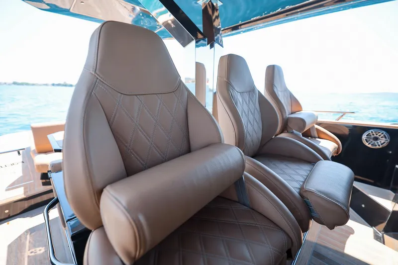 Slide: The Image of Luxurious leather seats on the 2025 Focus Forza 37 yacht, with ocean view. - 22