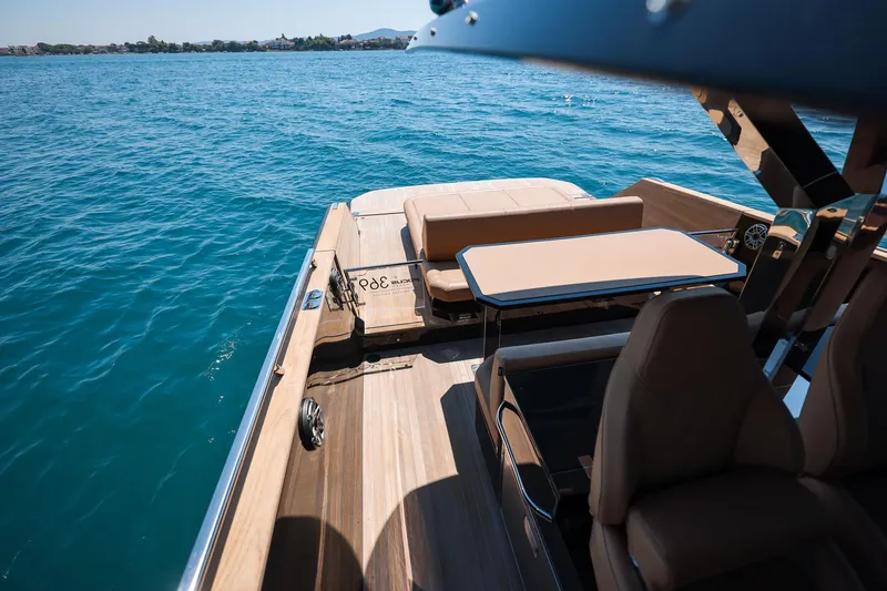 Slide: The Image of Luxury Focus Forza 37 yacht, 2025 model, with elegant deck seating on open water. - 23