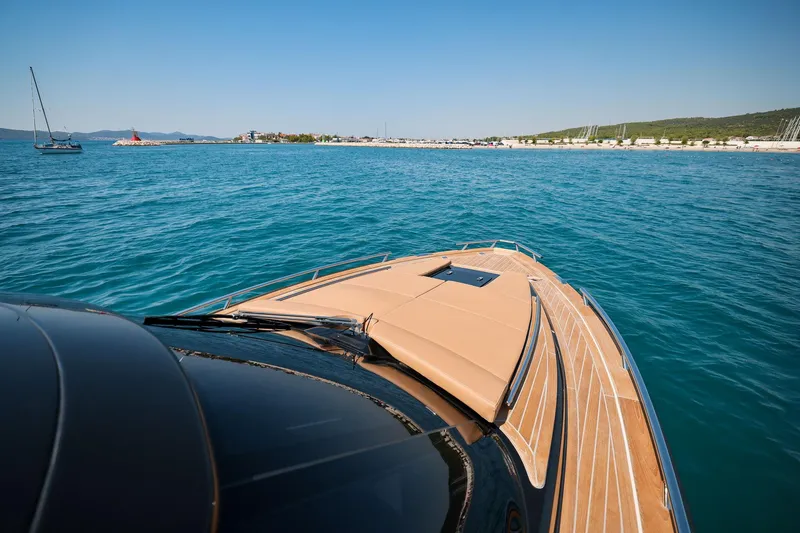 Slide: The Image of Luxury yacht Focus Forza 37 cruising on clear blue waters, 2025 model. - 27