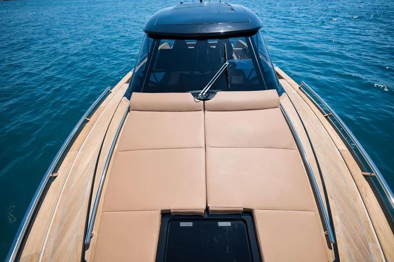 Slide: The Image of 2025 Focus Forza 37 luxury yacht with sleek design on open water. - 28