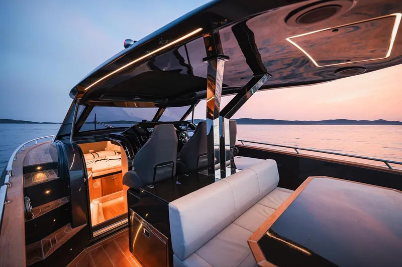 Slide: The Image of Luxurious 2025 Focus Forza 37 yacht interior at sunset, featuring sleek design and modern amenities. - 29