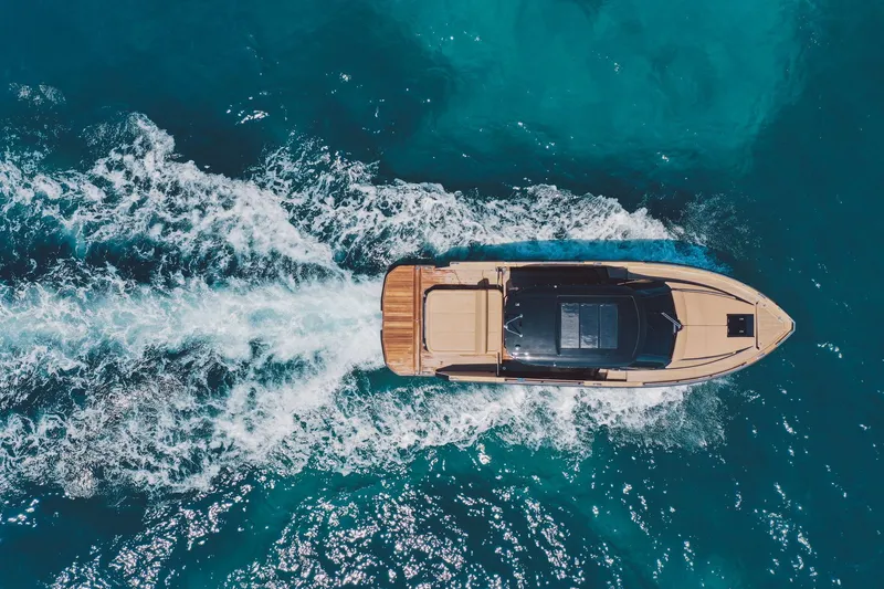 Slide: The Image of Aerial view of 2025 Focus Forza 37 yacht cruising in clear blue waters. - 3