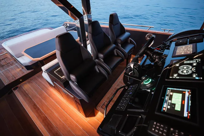 Slide: The Image of Luxurious 2025 Focus Forza 37 yacht interior with sleek seating and advanced control panels. - 30