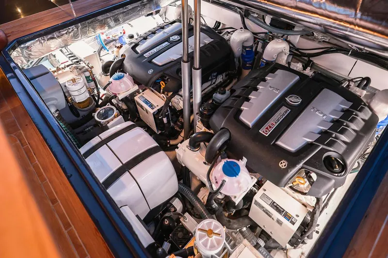 Slide: The Image of Engine compartment of 2025 Focus Forza 37, showcasing dual powerful engines and components. - 34