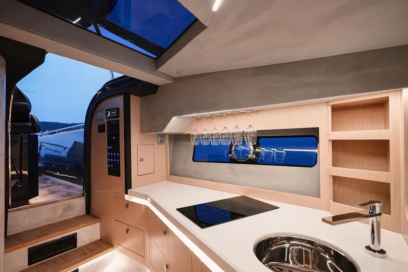 Slide: The Image of Modern kitchen interior of 2025 Focus Forza 37 yacht with sleek design and amenities. - 35