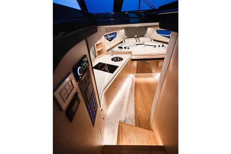 Slide: The Image of Luxurious interior of 2025 Focus Forza 37 yacht with modern amenities and elegant design. - 36