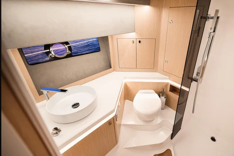Slide: The Image of Modern bathroom in 2025 Focus Forza 37 yacht with sleek design and ocean view. - 39