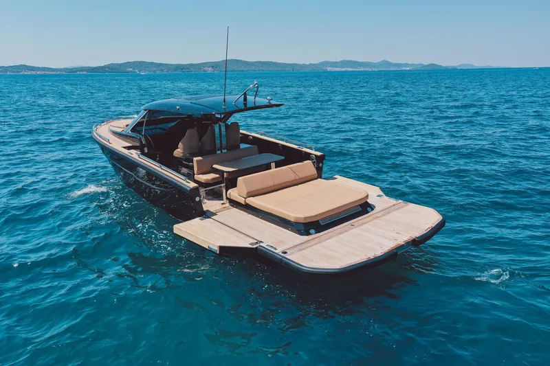 Slide: The Image of Luxury Focus Forza 37 yacht cruising on open sea, 2025 model. - 9