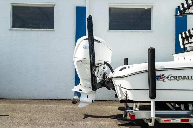Slide: The Image of 2025 Crevalle 26 HBW boat with Yamaha outboard motor on trailer. - 12