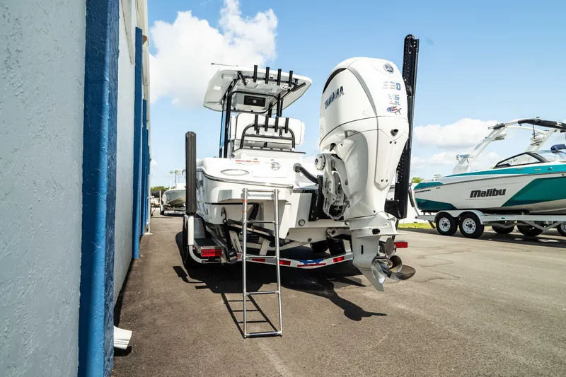 Slide: The Image of 2025 Crevalle 26 HBW boat with Yamaha outboard motor on trailer. - 14