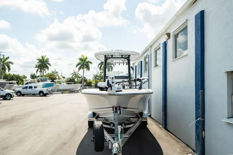 Slide: The Image of 2025 Crevalle 26 HBW boat on trailer in sunny outdoor lot. - 25