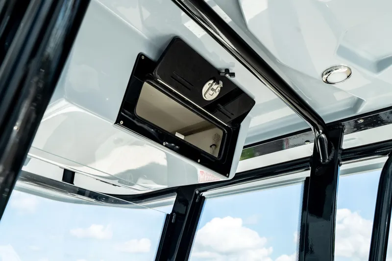 Slide: The Image of Overhead compartment in 2025 Crevalle 26 HBW boat. - 37