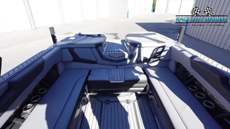 Slide: The Image of 2021 Nautique Super Air Nautique G25 interior with sleek seating and modern design. - 17